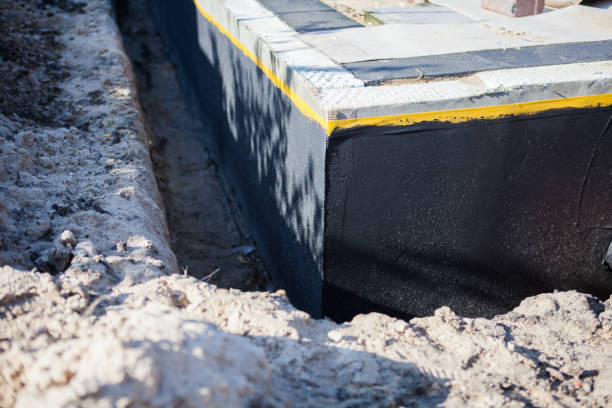 Professional Waterproofing technician working in Mobile, AL